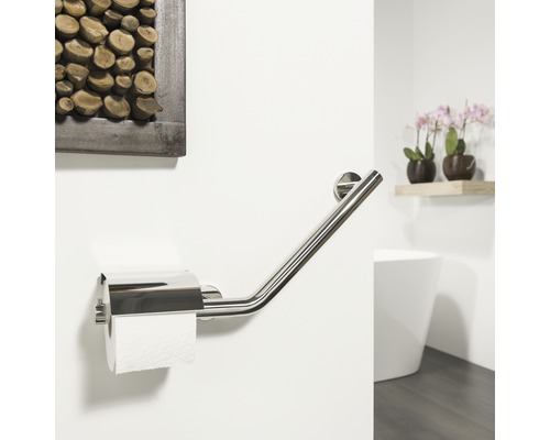 Toilettes avec barre d''appui et support papier toilette dans la salle de bains