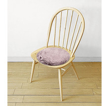 Coussin de chaise rond en fausse fourrure sur chaise en bois