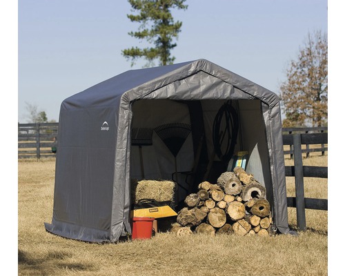 Gerätehaus ShelterLogic Shed-in-a-Box 297 x 305 cm grau Graue Geräteunterstandplane mit Gartengeräten und Holz