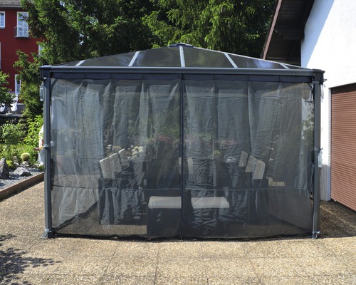 Tente de jardin avec rideaux et meubles