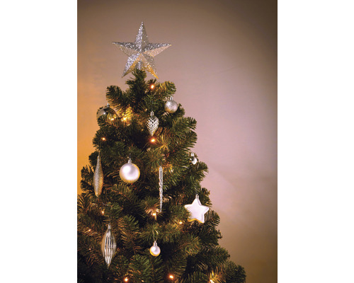 Sapin de Noël décoré avec étoile, boules de Noël et guirlande lumineuse