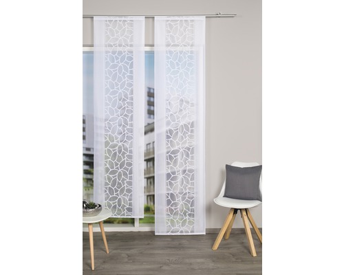Panneau japonais décoratif avec motif de feuilles devant une fenêtre