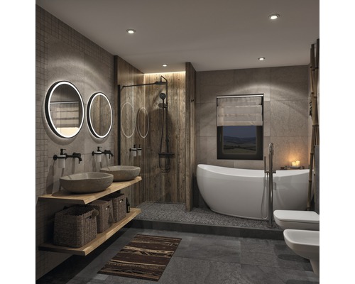 Salle de bains avec douche, baignoire, lavabo, miroirs et toilettes dans un design clair.