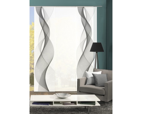 Salon avec panneaux japonais à motif ondulé devant la fenêtre