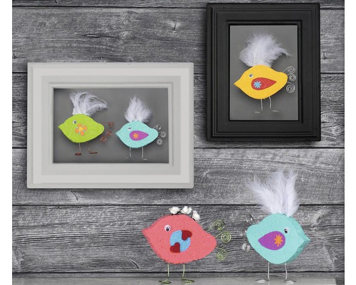 Dekorative Vogelfiguren und Bilderrahmen mit Vogelmotiven für die Wanddekoration