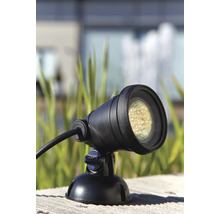 Gartenstrahler mit LED-Technik auf einer Holzoberfläche