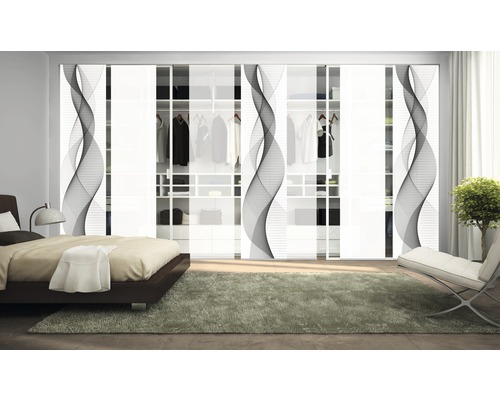 Chambre à coucher avec une grande armoire à portes coulissantes et des éléments de design