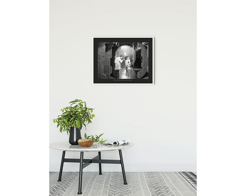 Image encadrée de deux personnes et d''un robot