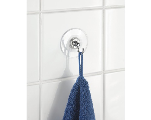 Porte-serviettes à ventouse avec serviette bleue au mur