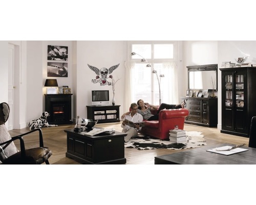 Salon avec canapé rouge, meubles noirs et décorations