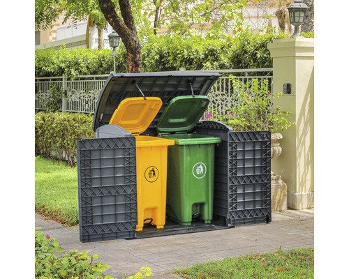 Abfallbox mit gelben und grünen Mülltonnen zur Mülltrennung im Aussenbereich
