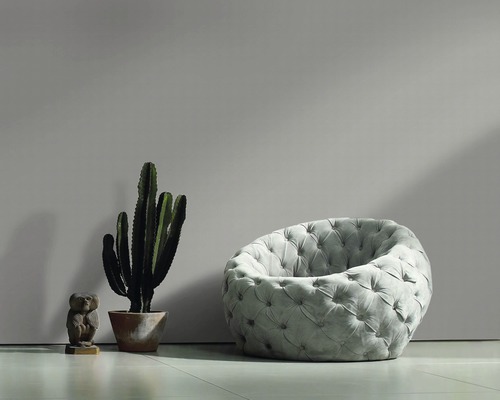Scène avec fauteuil, cactus et figurine décorative de hibou