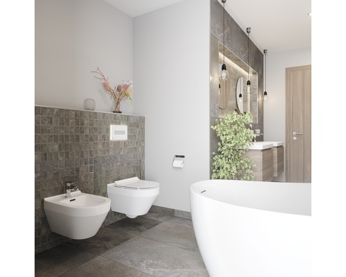 Modernes Badezimmer mit Bidet, Toilette und Badewanne