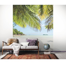 Salon avec papier peint photo d''une plage tropicale et de palmiers