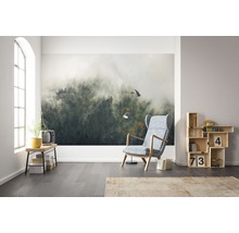 Wohnraum mit Fototapete, Sessel, Stehlampe und Holzregal
