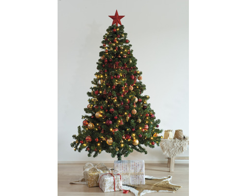 Sapin de Noël décoré avec des cadeaux