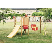 Aire de jeux avec balançoire et toboggan dans le jardin