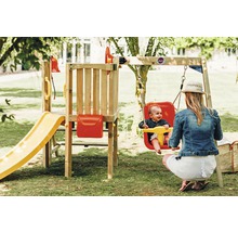 Aire de jeux avec balançoire et toboggan dans le jardin