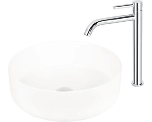 Aufsatzwaschbecken aus Keramik mit einer Armatur aus Metall