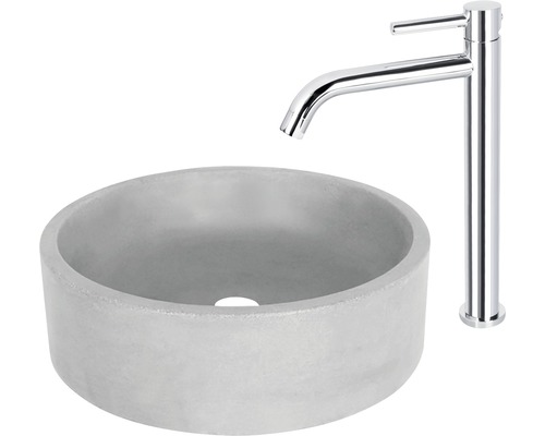 Vasque ronde en béton avec robinet chromé