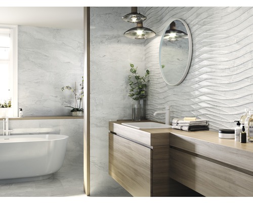 Salle de bains moderne avec carrelage blanc à motif ondulé, meuble-lavabo en bois et miroir ovale