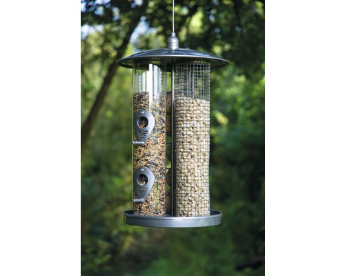 Vogelhaus mit Futtermischung und Erdnüssen