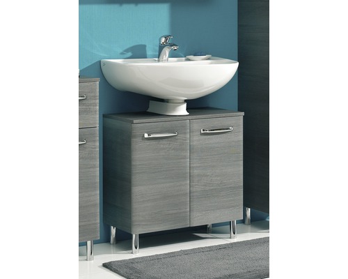 Combinaison de lavabo avec meuble sous-lavabo et lavabo en céramique dans la salle de bain