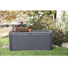 Graue Gartenbox mit Rattanmuster im Garten