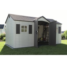 Abri de jardin avec double porte et fenêtre dans le jardin