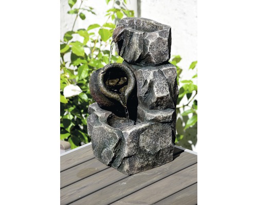 Fontaine d''intérieur décorative en imitation pierre avec pot à eau