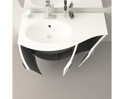 Meuble-lavabo avec meuble bas et portes ouvertes.