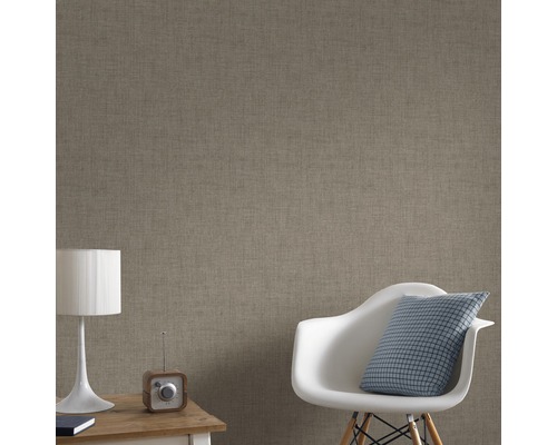 Gros plan d''un revêtement mural avec une structure textile dans un salon.