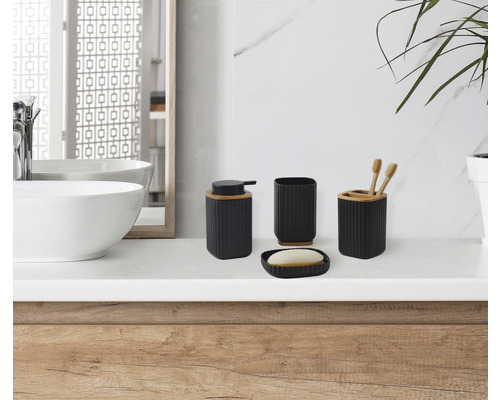 Ensemble d''accessoires de salle de bains avec distributeur de savon, porte-savon, gobelet à brosse à dents et porte-brosse à dents sur un lavabo