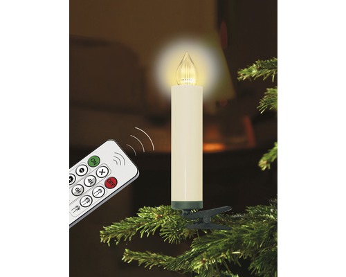 Bougie LED sans fil avec télécommande sur une branche de sapin