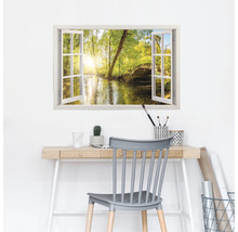 Sticker mural avec motif de fenêtre et vue sur une rivière dans la nature au-dessus d''un bureau