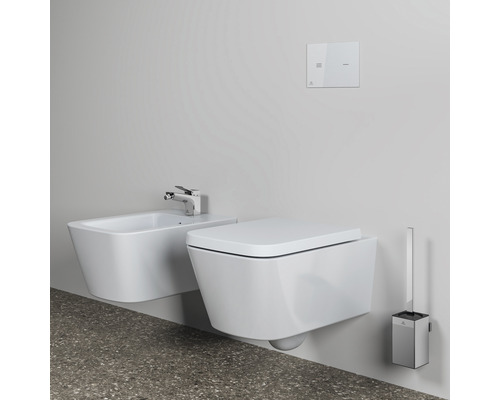 Bidet suspendu, WC suspendu, plaque de commande et garniture de WC dans la salle de bains