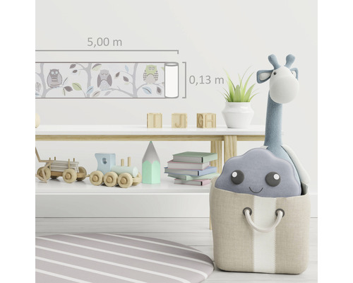 Chambre d''enfant avec bordure, jouets et tapis