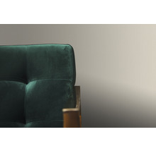 Detailansicht eines grünen Sofas mit Polsterung