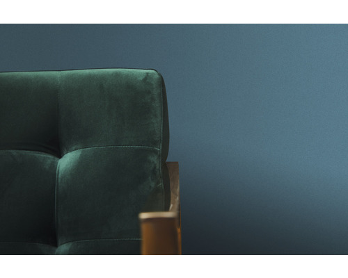 Detailansicht eines grünen Sofas mit Samtbezug