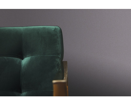 Gros plan d''un fauteuil rembourré avec capitonnage