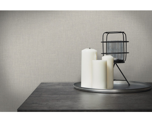 Gros plan d''un papier peint avec une texture de tissu, combiné avec des bougies et de la décoration