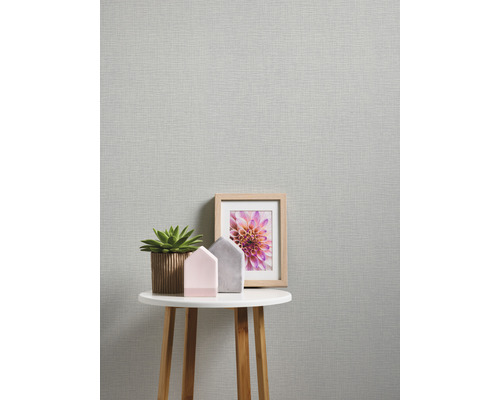 Gros plan d''un papier peint texturé avec décoration sur une table