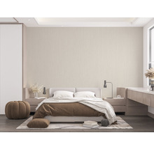 Chambre avec lit double, tables de chevet et décoration dans un design clair