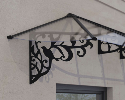 Vordach mit Vogelmotiv an einer Hauswand montiert