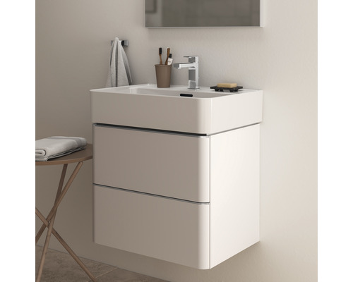 Meuble sous-lavabo avec deux tiroirs, lavabo, robinet et accessoires de salle de bain