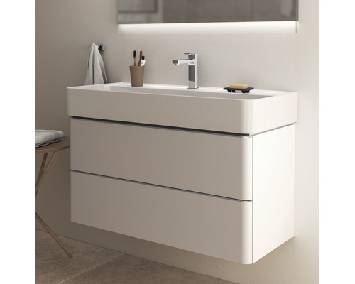 Waschtisch mit zwei Schubladen und Armatur im Badezimmer