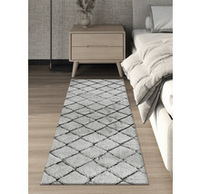 Teppich mit Rautenmuster im Schlafzimmer