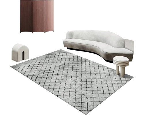 Einrichtung mit Teppich, Sofa, Schrank und Beistelltisch