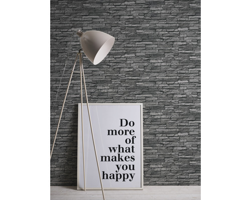 Papier peint gris aspect pierre avec lampadaire et citation encadrée