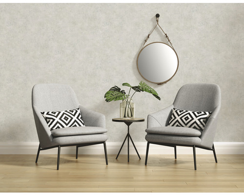 Wohnraum mit zwei Sesseln, Beistelltisch, Spiegel und Zimmerpflanze